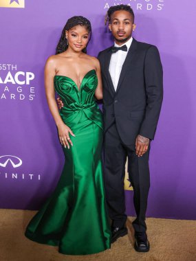 Halle Bailey ve erkek arkadaşı DDDG (Darryl Dwayne Granberry Jr.), 16 Mart 2024 'te ABD' nin Kaliforniya eyaletinin Los Angeles kentinde bulunan Shrine Auditorium ve Expo Hall 'da düzenlenen 55..