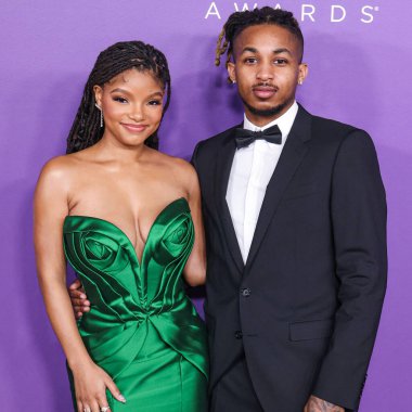 Halle Bailey and boyfriend DDG (Darryl Dwayne Granberry Jr.) arrive at the 55th Annual NAACP Image Awards held at the Shrine Auditorium and Expo Hall on March 16, 2024 in Los Angeles, California, United States. clipart