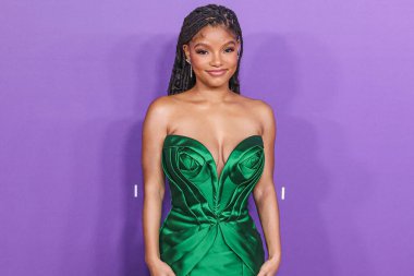 Halle Bailey wearing Nicole & Felicia Couture arrives at the 55th Annual NAACP Image Awards held at the Shrine Auditorium and Expo Hall on March 16, 2024 in Los Angeles, California, United States. clipart