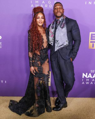 Meagan Good ve erkek arkadaşı Jonathan Majors, 16 Mart 2024 'te ABD' nin Kaliforniya eyaletinin Los Angeles kentindeki Shrine Auditorium ve Expo Hall 'da düzenlenen 55.. 