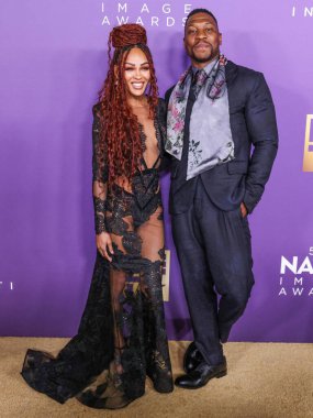 Meagan Good ve erkek arkadaşı Jonathan Majors, 16 Mart 2024 'te ABD' nin Kaliforniya eyaletinin Los Angeles kentindeki Shrine Auditorium ve Expo Hall 'da düzenlenen 55.. 