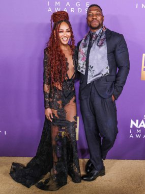 Meagan Good ve erkek arkadaşı Jonathan Majors, 16 Mart 2024 'te ABD' nin Kaliforniya eyaletinin Los Angeles kentindeki Shrine Auditorium ve Expo Hall 'da düzenlenen 55.. 