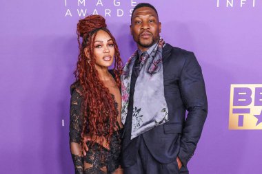 Meagan Good ve erkek arkadaşı Jonathan Majors, 16 Mart 2024 'te ABD' nin Kaliforniya eyaletinin Los Angeles kentindeki Shrine Auditorium ve Expo Hall 'da düzenlenen 55.. 