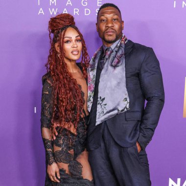 Meagan Good ve erkek arkadaşı Jonathan Majors, 16 Mart 2024 'te ABD' nin Kaliforniya eyaletinin Los Angeles kentindeki Shrine Auditorium ve Expo Hall 'da düzenlenen 55.. 
