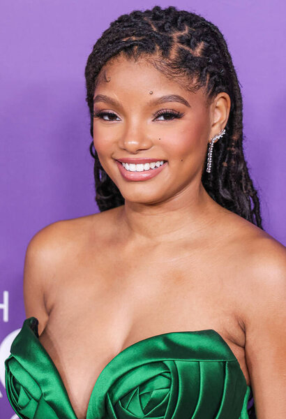 Halle Bailey wearing Nicole & Felicia Couture arrives at the 55th Annual NAACP Image Awards held at the Shrine Auditorium and Expo Hall on March 16, 2024 in Los Angeles, California, United States.