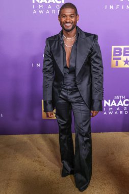 Usher IV, 16 Mart 2024 'te ABD' nin Kaliforniya eyaletinin Los Angeles kentindeki Shrine Konser Salonu 'nda düzenlenen 55. NAACP Resim Ödülleri' ne geldi..