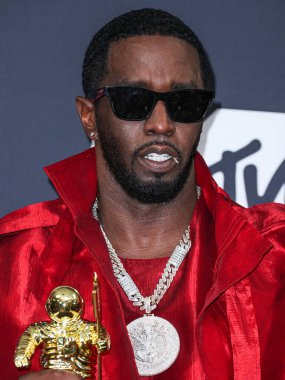  Diddy's Los Angeles and Miami Homes Raided by Federal Law Enforcement on Monday, March 25, 2024. NEWARK, NEW JERSEY, USA - SEPTEMBER 12: American rapper, record producer and record executive Diddy clipart