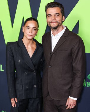 Alice Braga and Wagner Moura arrive at the Los Angeles Special Screening Of A24's 'Civil War' held at the Academy Museum of Motion Pictures on April 2, 2024 in Los Angeles, California, United States. clipart