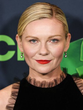 Kirsten Dunst arrives at the Los Angeles Special Screening Of A24's 'Civil War' held at the Academy Museum of Motion Pictures on April 2, 2024 in Los Angeles, California, United States. clipart