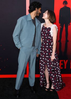 Dev Patel and girlfriend Tilda Cobham-Hervey arrive at the Los Angeles Premiere Of Universal Pictures 'Monkey Man' held at the TCL Chinese Theatre IMAX on April 3, 2024 in Hollywood, Los Angeles, California, United States. clipart