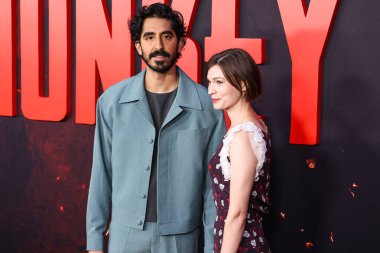 Dev Patel and girlfriend Tilda Cobham-Hervey arrive at the Los Angeles Premiere Of Universal Pictures 'Monkey Man' held at the TCL Chinese Theatre IMAX on April 3, 2024 in Hollywood, Los Angeles, California, United States. clipart