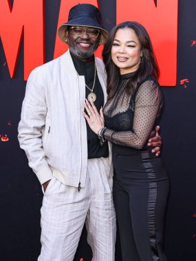 Lil Rel Howery and girlfriend Dannella Lane arrive at the Los Angeles Premiere Of Universal Pictures 'Monkey Man' held at the TCL Chinese Theatre IMAX on April 3, 2024 in Hollywood, Los Angeles, California, United States. clipart