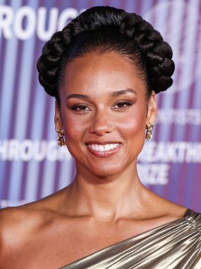 Alicia Keys arrives at the 10th Annual Breakthrough Prize Ceremony held at the Academy Museum of Motion Pictures on April 13, 2024 in Los Angeles, California, United States. clipart