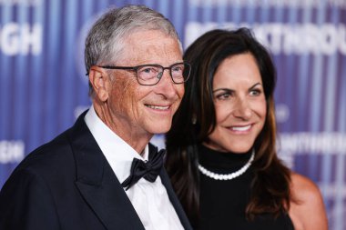 Bill Gates and girlfriend Paula Hurd arrive at the 10th Annual Breakthrough Prize Ceremony held at the Academy Museum of Motion Pictures on April 13, 2024 in Los Angeles, California, United States.  clipart