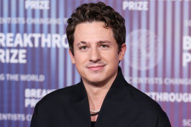Charlie Puth arrives at the 10th Annual Breakthrough Prize Ceremony held at the Academy Museum of Motion Pictures on April 13, 2024 in Los Angeles, California, United States.