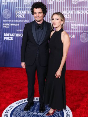 Damien Chazelle ve eşi Olivia Hamilton, 13 Nisan 2024 'te Los Angeles, Kaliforniya, ABD' deki Akademi Sinema Müzesi 'nde düzenlenen 10.