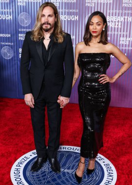 Marco Perego ve eşi Zoe Saldana, 13 Nisan 2024 'te Los Angeles, Kaliforniya, ABD' deki Akademi Sinema Müzesi 'nde düzenlenen 10..