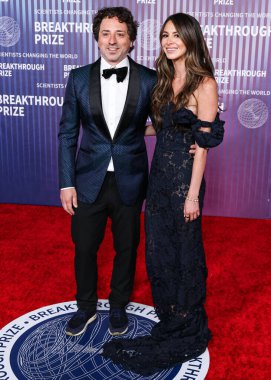 Sergey Brin and Gerelyn Gilbert-Soto arrive at the 10th Annual Breakthrough Prize Ceremony held at the Academy Museum of Motion Pictures on April 13, 2024 in Los Angeles, California, United States. clipart