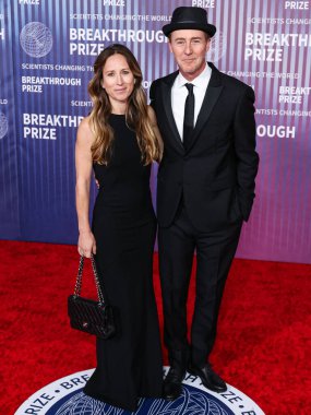 Shauna Robertson and husband Edward Norton arrive at the 10th Annual Breakthrough Prize Ceremony held at the Academy Museum of Motion Pictures on April 13, 2024 in Los Angeles, California, United States. clipart