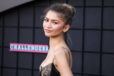 LOS ANGELES, CALIFORNIA, USA - APRIL 16: American actress and singer Zendaya wearing a custom Vera Wang dress and Bulgari jewelry arrives at Premiere Of Amazon MGM Studios' 'Challengers' held at Westwood Village Theater  clipart