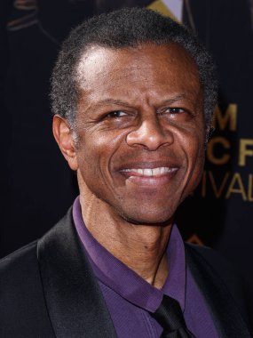 Phil LaMarr arrives at the 15th Annual TCM Classic Film Festival 2024 Opening Night And 30th Anniversary Presentation Of Miramax's 'Pulp Fiction' held at the TCL Chinese Theatre on April 18, 2024 in Hollywood, Los Angeles, California, United States.  clipart