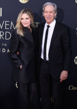 Michelle Pfeiffer and husband David E. Kelley arrive at the 49th Annual AFI (American Film Institute) Lifetime Achievement Award Gala Tribute Celebrating Nicole Kidman held at the Dolby Theatre on April 27, 2024 in Hollywood, Los Angeles, California clipart
