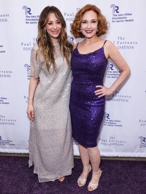 Kaley Cuoco and Amy Yasbeck arrive at The John Ritter Foundation For Aortic Health's 'Evening From the Heart Gala' 2024 held at the Sunset Room Hollywood on May 9, 2024 in Hollywood, Los Angeles, California, United States.  clipart