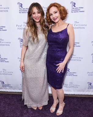 Kaley Cuoco and Amy Yasbeck arrive at The John Ritter Foundation For Aortic Health's 'Evening From the Heart Gala' 2024 held at the Sunset Room Hollywood on May 9, 2024 in Hollywood, Los Angeles, California, United States.  clipart