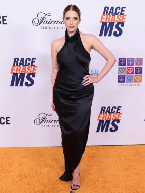 Ashley Benson arrives at the 31st Annual Race To Erase MS Gala 2024 held at the Fairmont Century Plaza on May 10, 2024 in Century City, Los Angeles, California, United States.  clipart