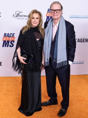 Kathy Hilton and husband Richard Hilton arrive at the 31st Annual Race To Erase MS Gala 2024 held at the Fairmont Century Plaza on May 10, 2024 in Century City, Los Angeles, California, United States. clipart