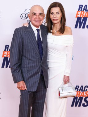 Robert Shapiro and wife Linell Shapiro arrive at the 31st Annual Race To Erase MS Gala 2024 held at the Fairmont Century Plaza on May 10, 2024 in Century City, Los Angeles, California, United States.  clipart