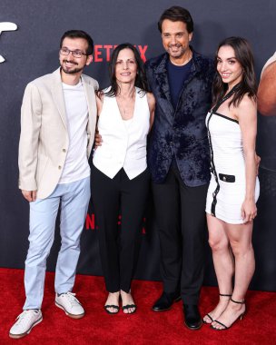 Daniel Macchio, Phyllis Fierro, Ralph Macchio, Julia Macchio arrive at Los Angeles Special Screening Of Netflix's 'Cobra Kai' Season 6, Part 1 held at Autry Museum of American West at Griffith Park on July 17, 2024 in Los Angeles, California, USA. clipart