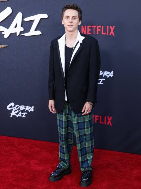 Jacob Bertrand, Netflix 'in' Kobra Kai 'Sezon 6 Bölüm 1' in Los Angeles Özel Gösterimi 'ne 17 Temmuz 2024' te ABD 'nin Kaliforniya eyaletinin başkenti Los Angeles' ta bulunan Griffith Park 'taki Amerikan Batısındaki Autry Müzesi' ne geldi..