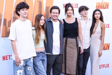 Mark Wahlberg, wife Rhea Durham, son Michael Wahlberg and Sunni Gaines arrive at the Los Angeles Premiere Of Netflix's 'The Union' held at The Egyptian Theatre Hollywood on August 12, 2024 in Hollywood, Los Angeles, California, United States. 