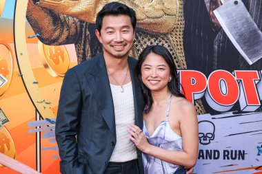 Simu Liu and girlfriend Allison Hsu arrive at the Los Angeles Premiere Of Amazon MGM Studios' 'Jackpot!' held at the TCL Chinese Theatre IMAX on August 13, 2024 in Hollywood, Los Angeles, California, United States.  clipart