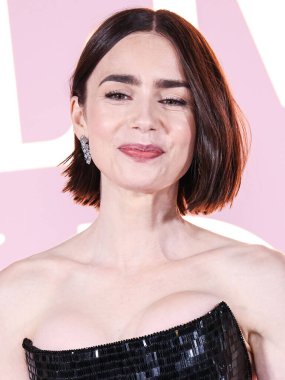 Lily Collins wearing a custom Armani Prive dress arrives at the Los Angeles Premiere Of Netflix's 'Emily In Paris' Season 4 Part 1 held at The Egyptian Theatre Hollywood on August 14, 2024 in Hollywood, Los Angeles, California, United States.  clipart