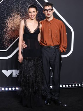 Margaret Qualley and Jack Antonoff arrive at the 2024 MTV Video Music Awards held at UBS Arena on September 11, 2024 in Elmont, New York, United States.  clipart