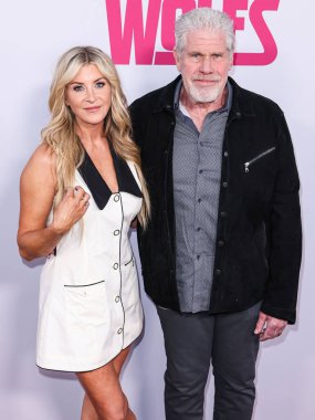 Allison Dunbar and Ron Perlman arrive at the Los Angeles Premiere Of Apple TV+'s 'Wolfs' held at the TCL Chinese Theatre IMAX on September 18, 2024 in Hollywood, Los Angeles, California, United States.  clipart