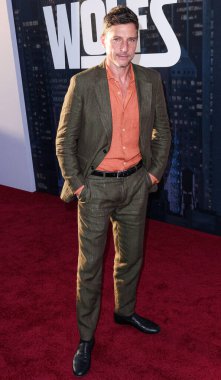 Simon Rex arrives at the Los Angeles Premiere Of Apple TV+'s 'Wolfs' held at the TCL Chinese Theatre IMAX on September 18, 2024 in Hollywood, Los Angeles, California, United States.  clipart