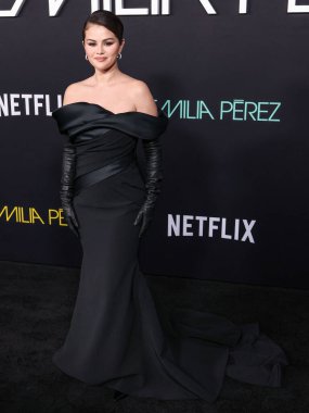 Selena Gomez wearing Elie Saab arrives at the Los Angeles Premiere of Netflix's 'Emilia Perez' held at The Egyptian Theatre Hollywood on October 21, 2024 in Hollywood, Los Angeles, California, United States. clipart