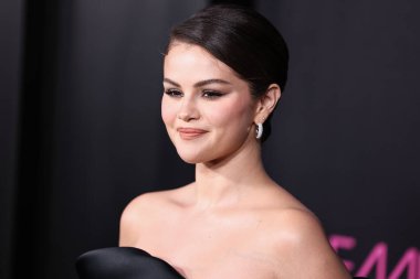 Selena Gomez wearing Elie Saab arrives at the Los Angeles Premiere of Netflix's 'Emilia Perez' held at The Egyptian Theatre Hollywood on October 21, 2024 in Hollywood, Los Angeles, California, United States. clipart