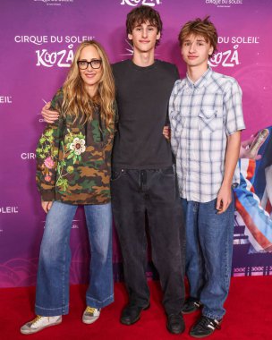 Kim Raver, son Leo Boyer and Kai arrive at Cirque du Soleil's 'KOOZA' Red Carpet Premiere held at the Santa Monica Pier on October 24, 2024 in Santa Monica, Los Angeles, California, United States.  clipart