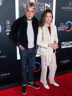 Darren Ramirez and Jacqueline Bisset arrive at The French American Film Festival - Opening Night Premiere Of Netflix's 'Emilia Perez' held at the Directors Guild of America Theater Complex on October 29, 2024 in Los Angeles, California, United States clipart