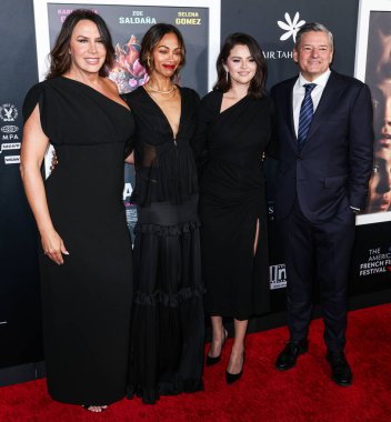 Karla Sofia Gascon, Zoe Saldana, Selena Gomez and Ted Sarandos arrive at The French American Film Festival - Opening Night Premiere Of Netflix's 'Emilia Perez' held at the Directors Guild of America Theater Complex on October 29, 2024 in Los Angeles clipart