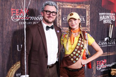 Johnny Manziel and Josie Canseco arrive at Darren Dzienciol's Haunted Hotel Halloween Party 2024 presented by UTOPIA and Casa Azul Organic Tequila held at the Fairmont Century Plaza on November 1, 2024 in Century City, Los Angeles, California, USA clipart