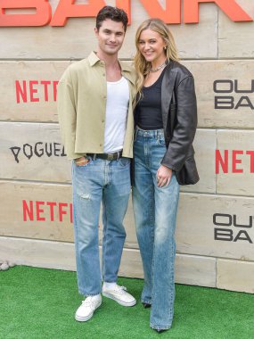 Chase Stokes and girlfriend Kelsea Ballerini arrive at Netflix's Poguelandia 2024 Event Celebrating 'Outer Banks' Season 4 Part 2 held at Barker Hangar on November 2, 2024 in Santa Monica, Los Angeles, California, United States.  clipart