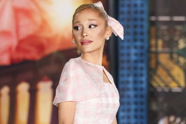 Ariana Grande Butera wearing custom Thom Browne arrives at the Los Angeles Premiere Of Universal Pictures' 'Wicked' held at the Dorothy Chandler Pavilion at The Music Center on November 9, 2024 in Los Angeles, California, United States. clipart