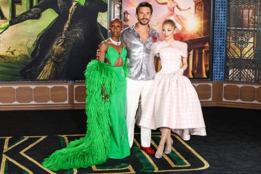 Cynthia Erivo, Jonathan Bailey and Ariana Grande Butera arrive at the Los Angeles Premiere Of Universal Pictures' 'Wicked' held at the Dorothy Chandler Pavilion at The Music Center on November 9, 2024 in Los Angeles, California, United States. clipart