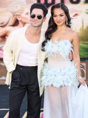 Sasha Farber and Jenn Tran arrive at the Los Angeles Premiere Of Universal Pictures' 'Wicked' held at the Dorothy Chandler Pavilion at The Music Center on November 9, 2024 in Los Angeles, California, United States. clipart