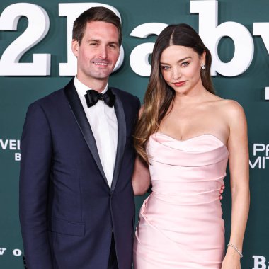 Evan Spiegel and wife Miranda Kerr arrive at the 2024 Baby2Baby Gala Presented by Paul Mitchell held at the Pacific Design Center on November 9, 2024 in West Hollywood, Los Angeles, California, United States.  clipart